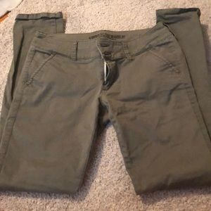 American Eagle green skinny jeans